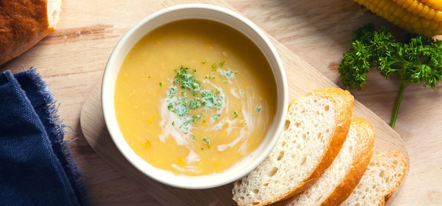 cream soup with bread on the side