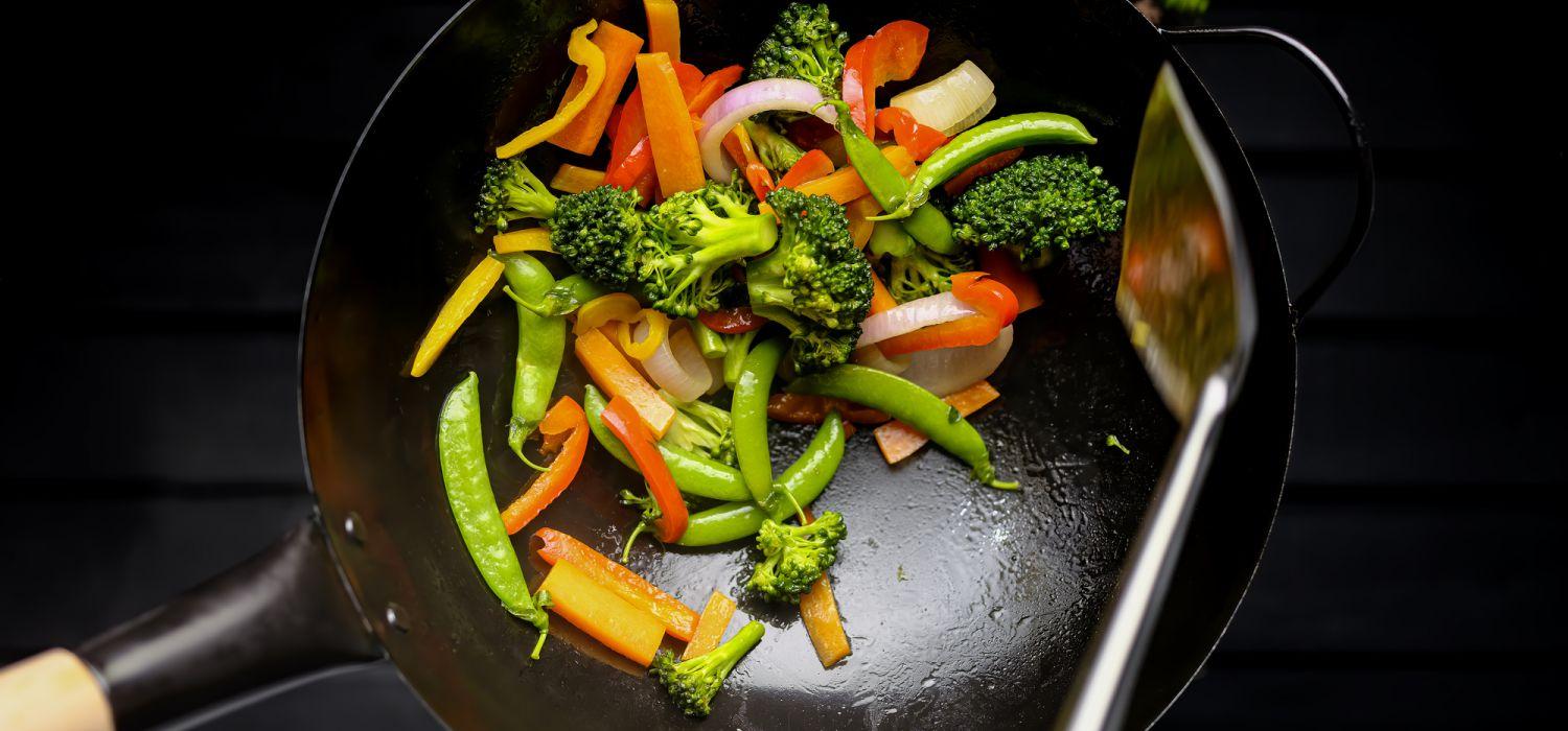 stir fry vegetables on wok